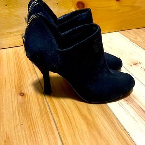 X-appeal, black heels with gold zipper up back, size 7, worn 1-2 times
